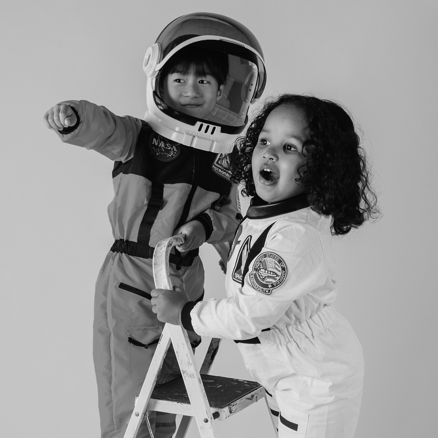 Two children dressed as astronauts
